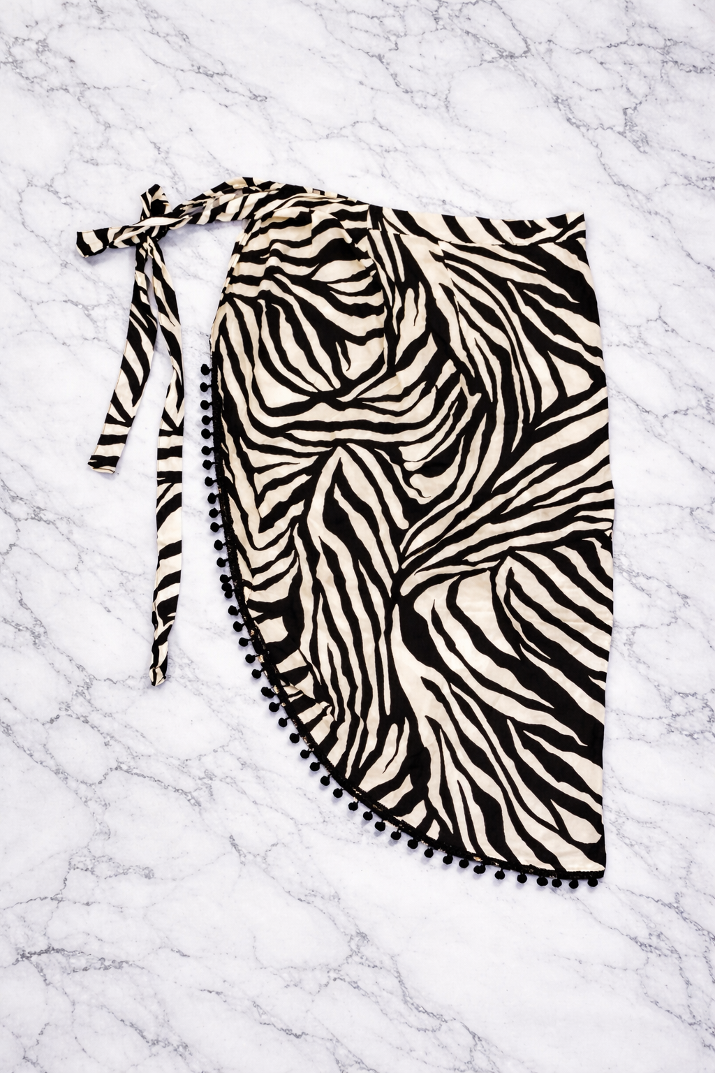 Zebra Print Wrap Skirt with Pom Pom Trim
